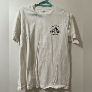 3 white graphic tees